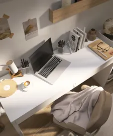 A minimalist workspace featuring a sleek laptop on a white desk, designed for productivity and comfort in a home office environment, enhanced by Homestyler's real-time 3D rendering.