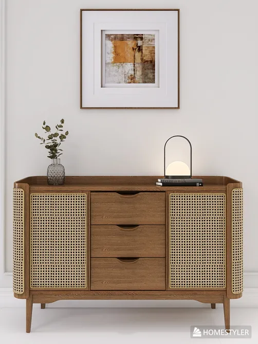 A wooden sideboard with woven rattan doors and three drawers, styled with a decorative vase and lamp, showcasing contemporary interior decor in a modern living space. This design utilizes Homestyler's real-time 3D rendering feature for an effective design proposal.